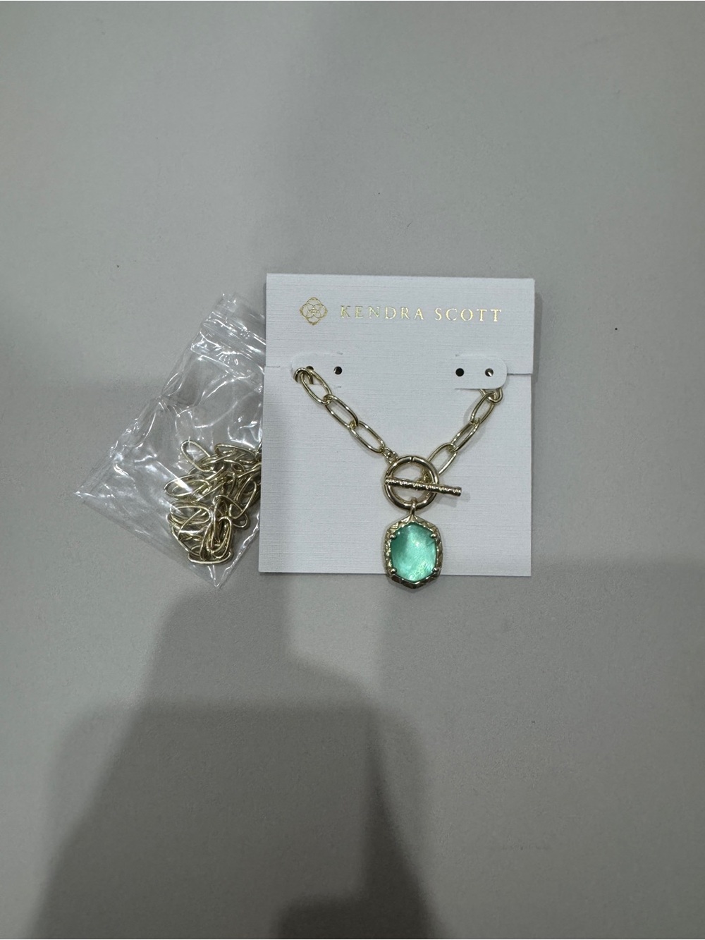 Kendra Scott Gold Link Necklace with Mint Green Pendant